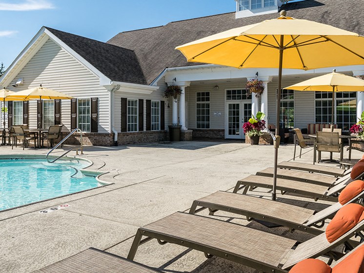 Sundeck Lounge Chairs Around Pool
